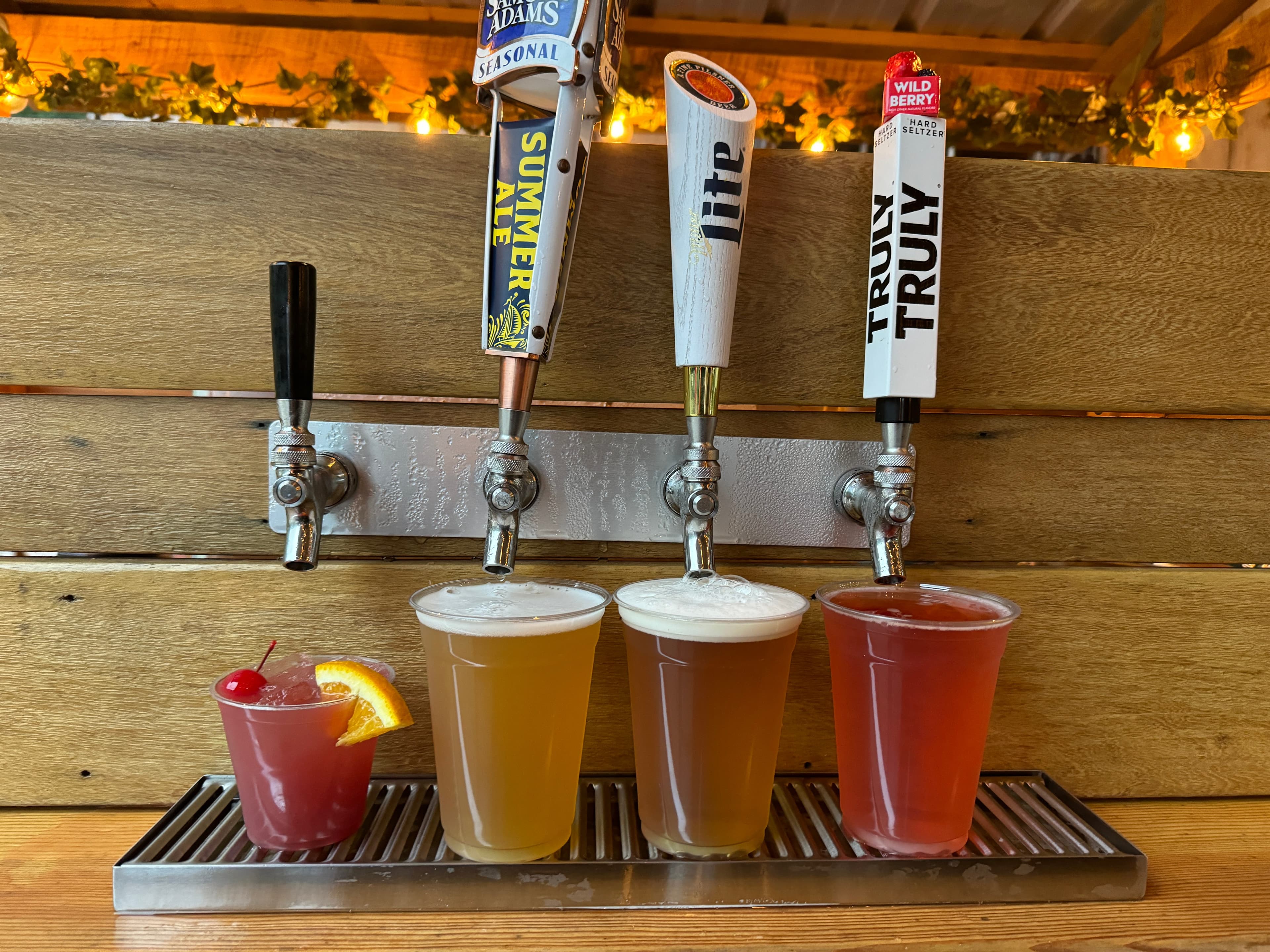 Draft beers being poured at tap trailer