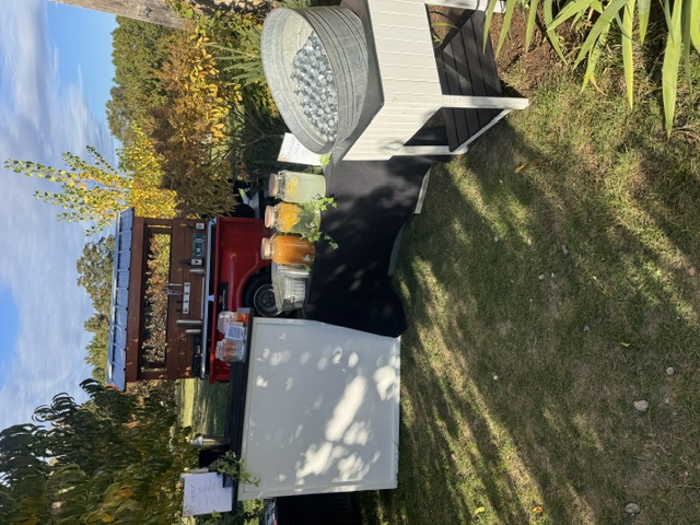 1968 Chevy tap trailer full setup with satellite bar and hydration station at daytime event